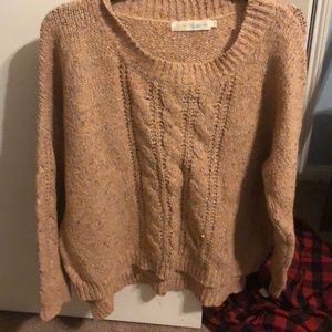 Orange sweater. Size medium.